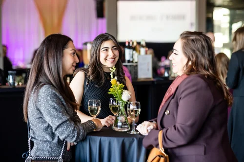 Three women networking at ACE Scholarships luncheon Seawell Ballroom Denver Colorado