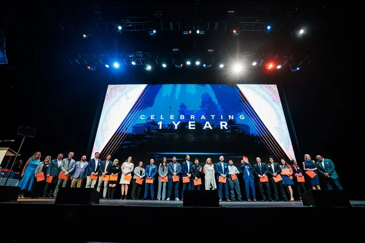 Group of award honorees on stage at Denver Broncos Honors celebrating one year Mission Ballroom