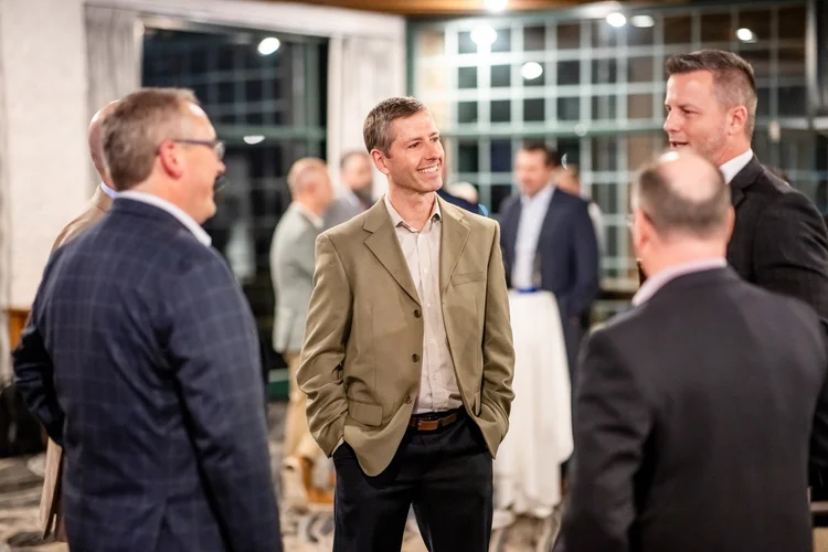 Speaker at podium during corporate awards dinner DTC Englewood Colorado event photographer