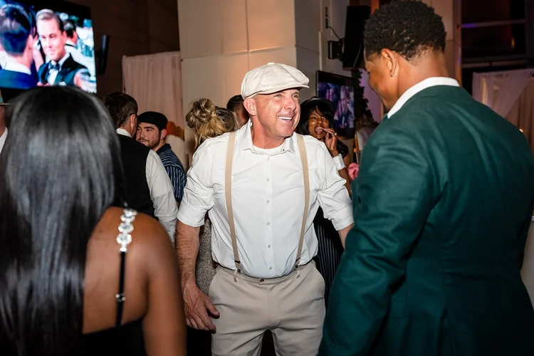Corporate holiday party event photography Denver Broncos Empower Field Colorado