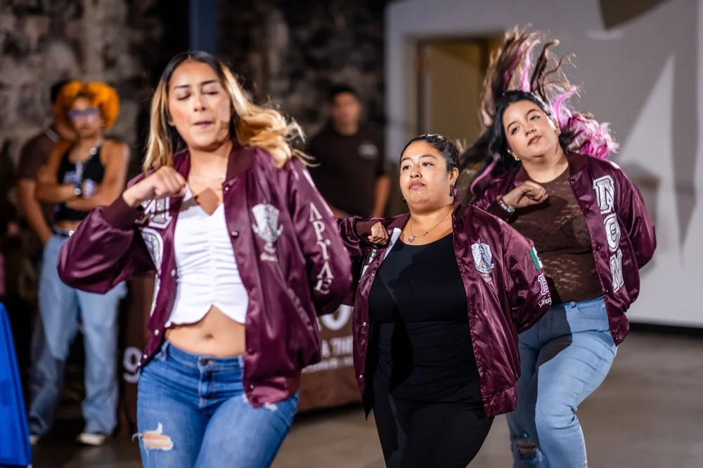 Lambda Pi sorority members strolling at Meet the Greeks Tivoli Turnhalle MSU Denver