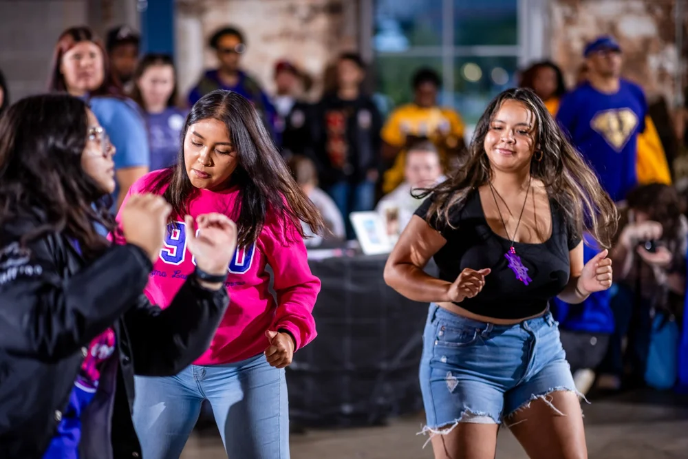 Sorority members dancing at Meet the Greeks event Tivoli Turnhalle Auraria Campus Denver