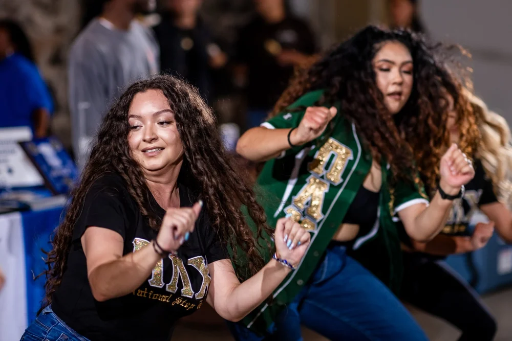 Pi Alpha Chi sorority members strolling at Meet the Greeks MSU Denver Auraria Campus
