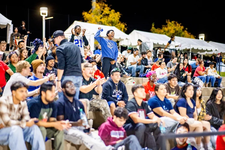 MSU Denver students cheering at homecoming event photography Regency Athletic Complex Denver Colorado