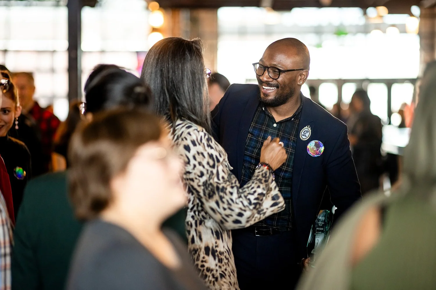 Award recipient networking and connecting at MLK Peace Breakfast Mile High Station Denver