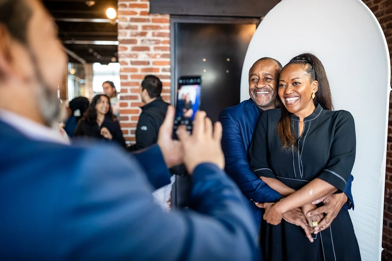 Couple posing at photo booth at MSU Denver MLK Peace Breakfast Mile High Station Denver