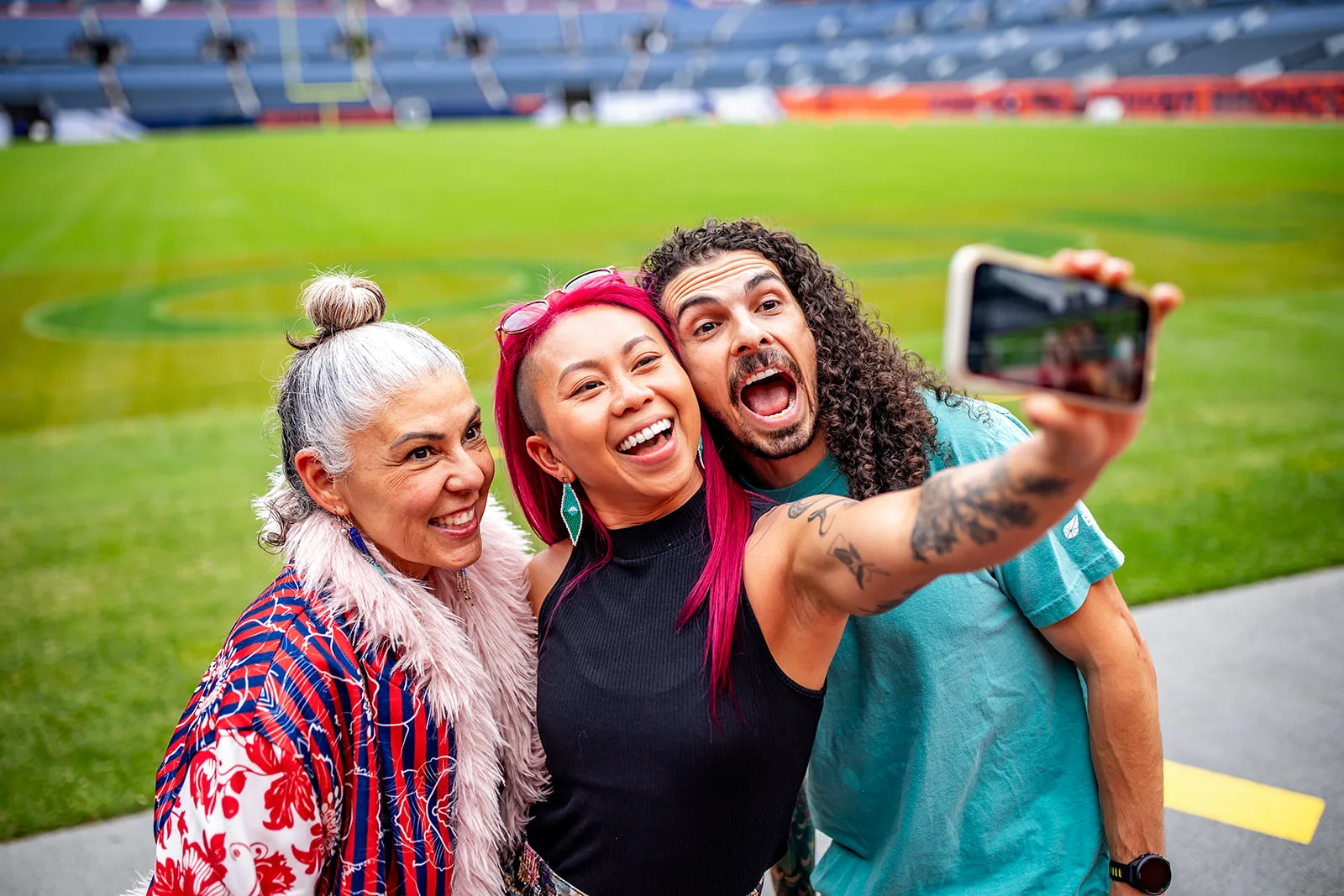 Holiday party event photography at Empower Field Denver Colorado