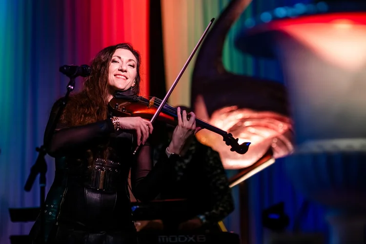 Violinist performing live at Denver event